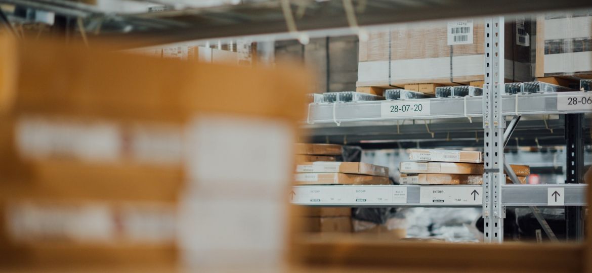Boxes stacked on warehouse shelves